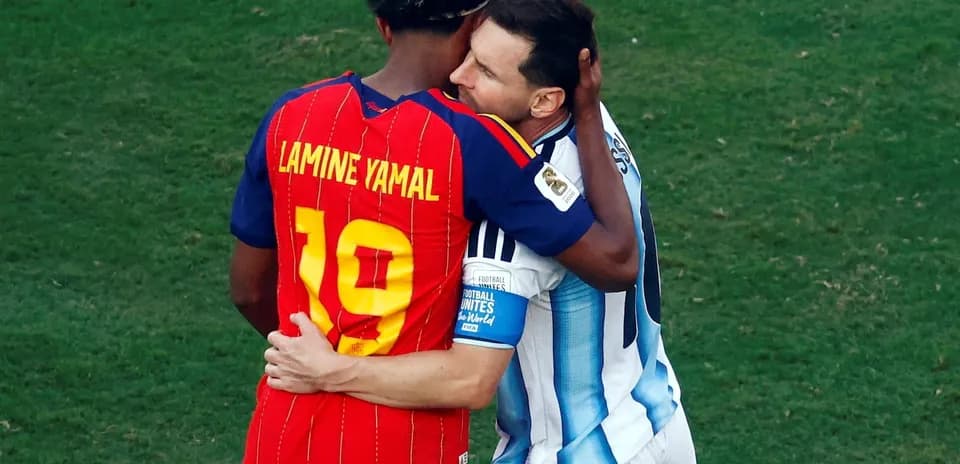 Lamine Yamal and Messi embrace after match
