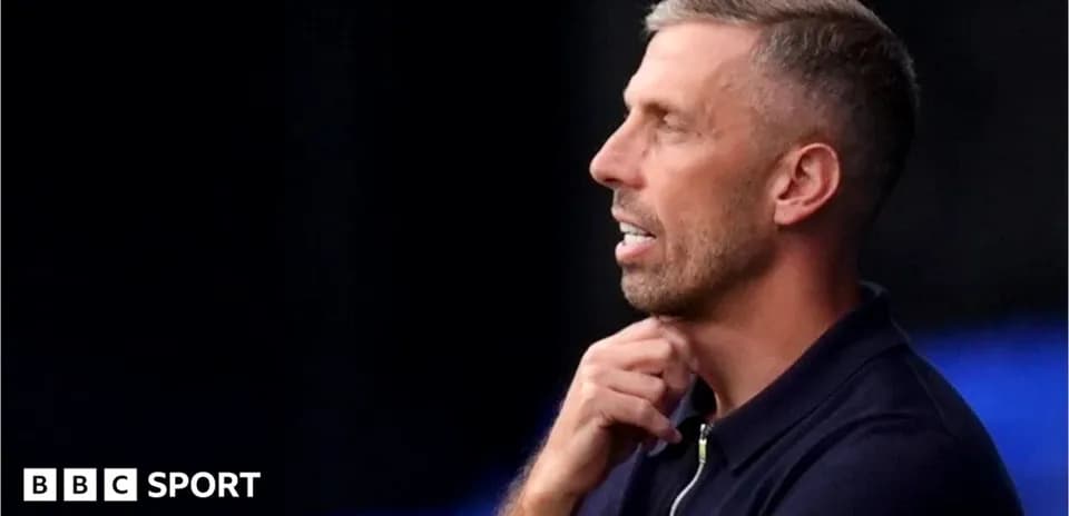 Coach deep in thought during match observation