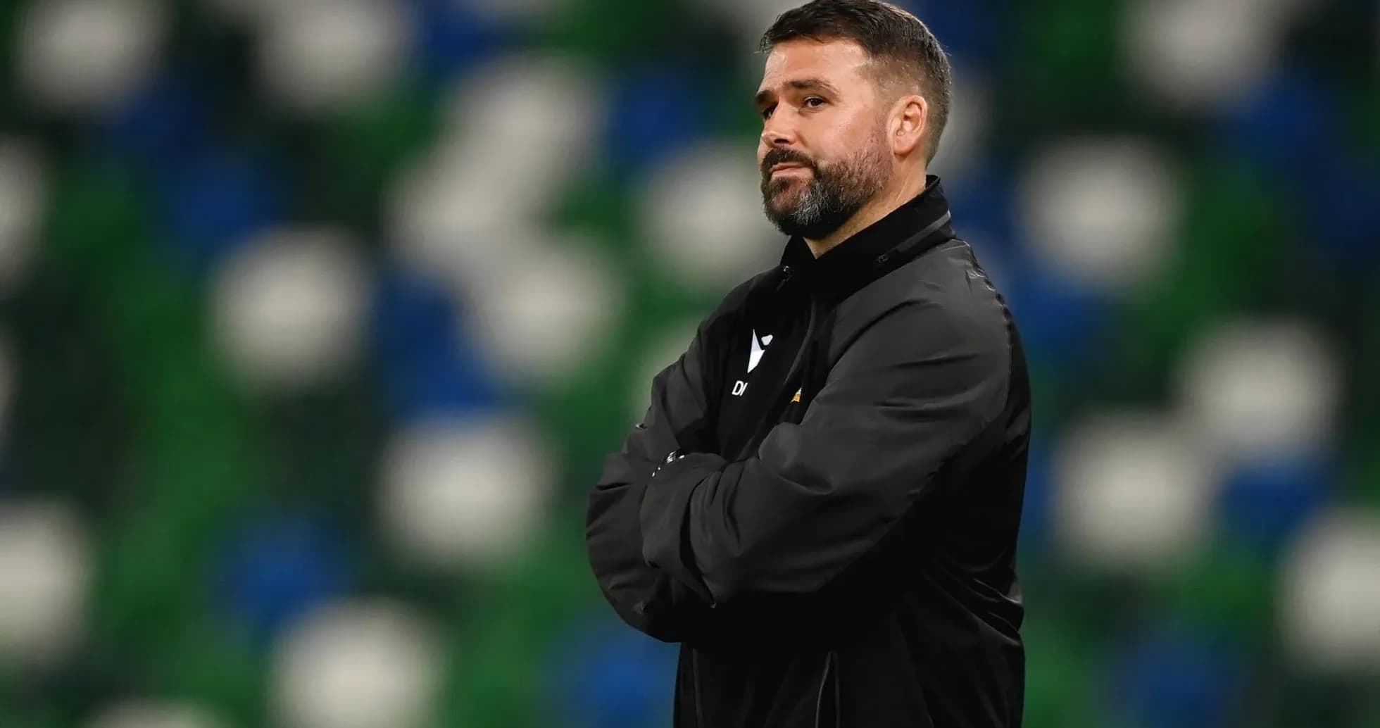 Coach observing the game from the sidelines