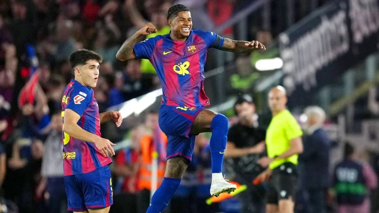 Barcelona players celebrating a goal on the field
