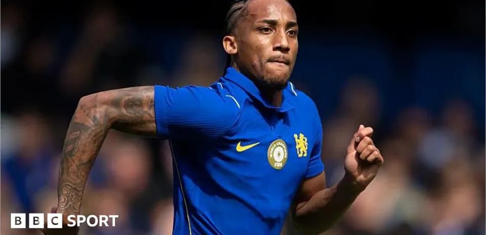 Player running in Chelsea blue kit during match