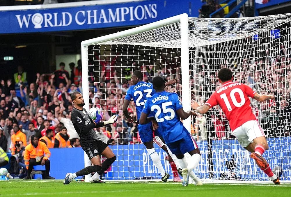 Chelsea goalkeeper saves shot during match