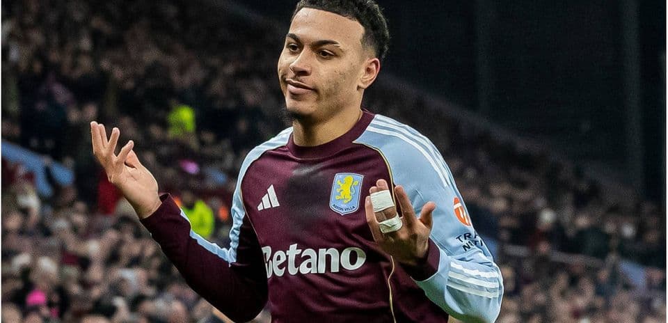 Player gesturing during a match for Aston Villa