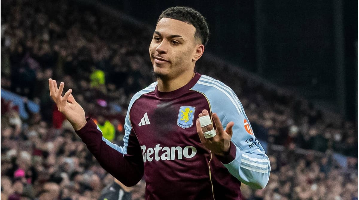 Player gesturing during a match for Aston Villa