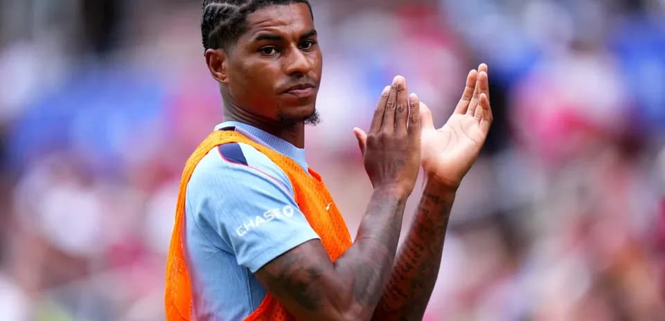 Player clapping on the sidelines during match