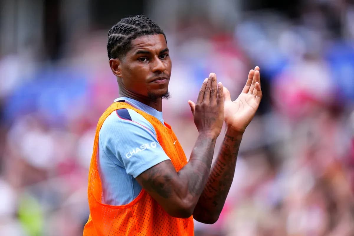 Player clapping on the sidelines during match