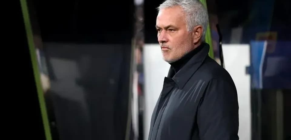 Manager observing the game from the sidelines