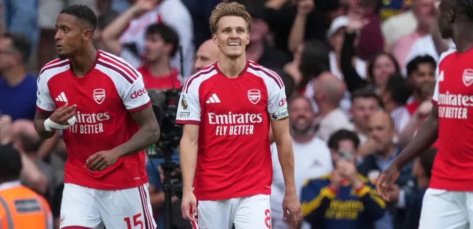 Arsenal players celebrating during match