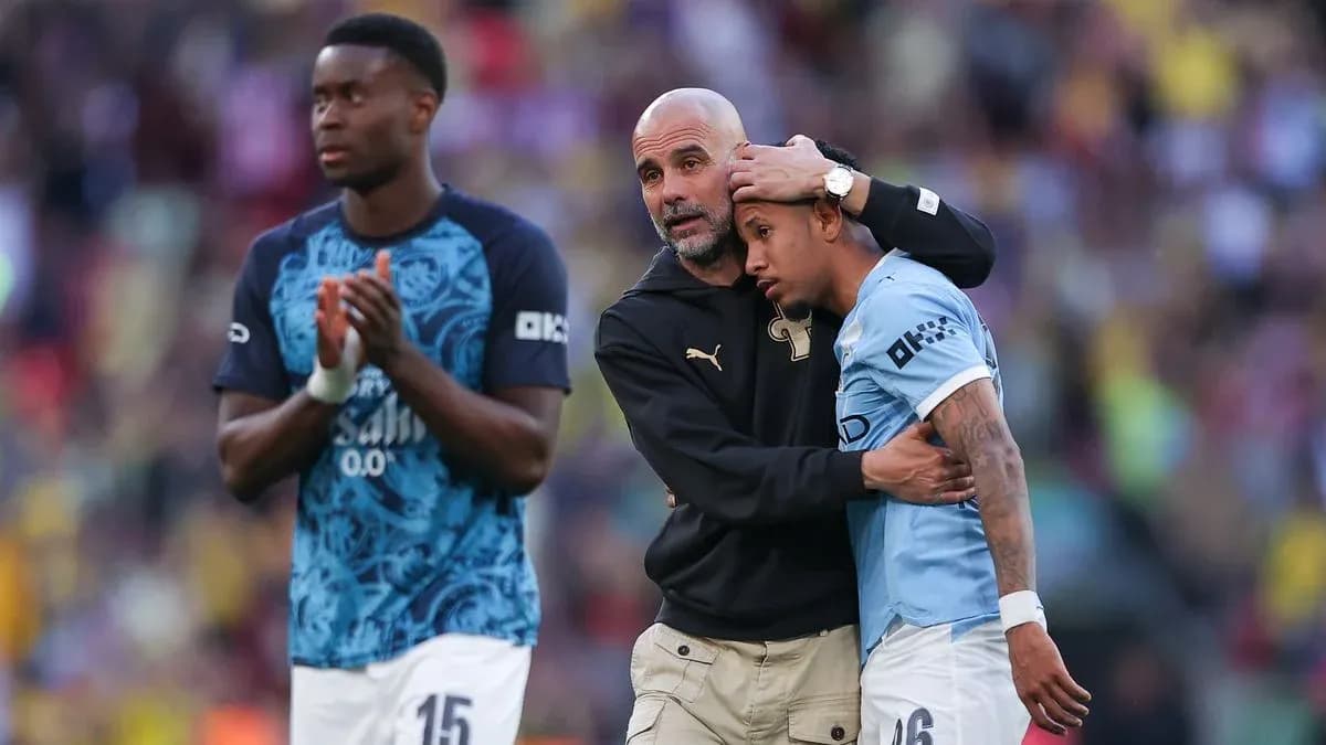 Manager comforting player after match on field