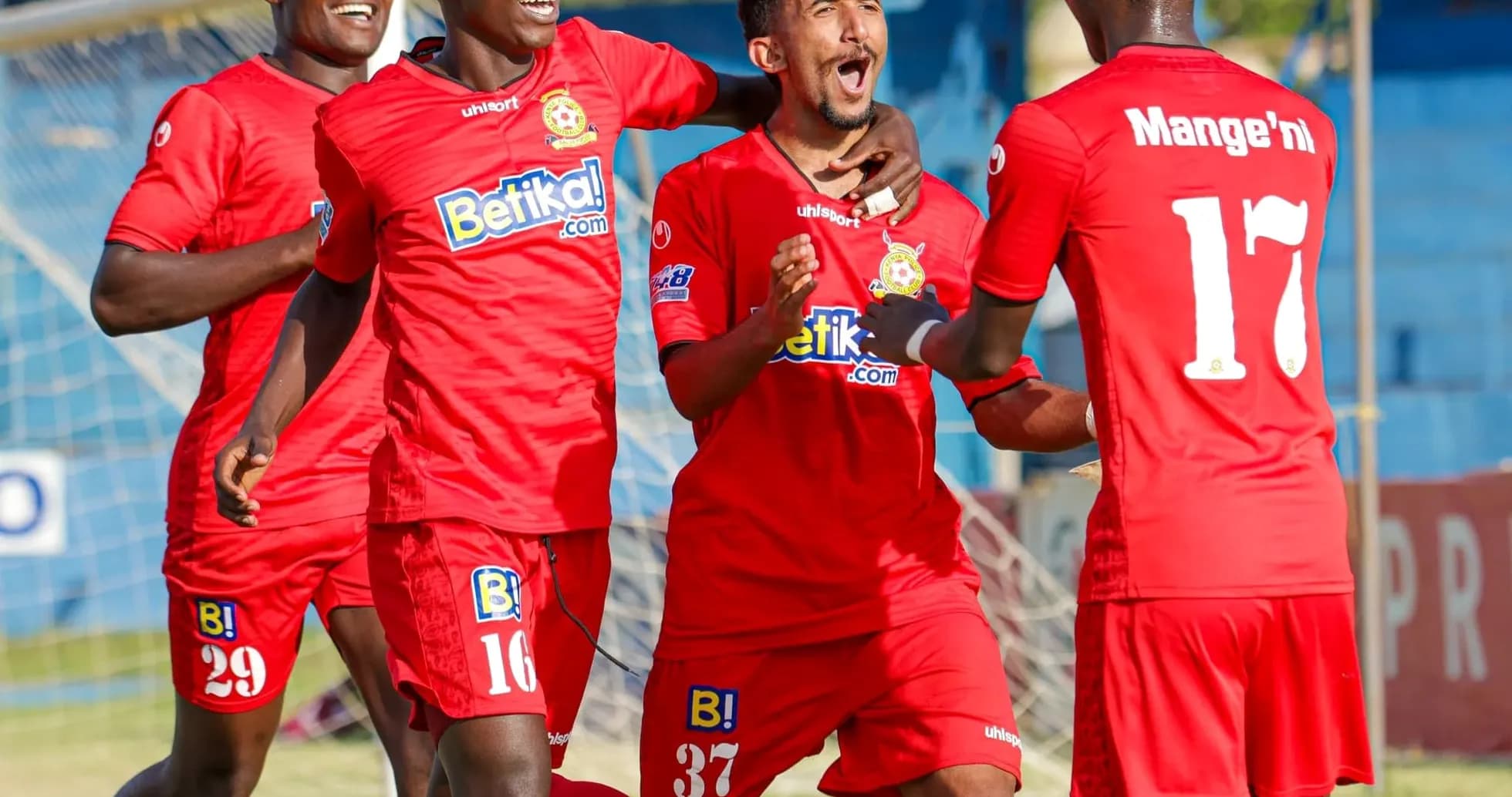 Players celebrating a goal in FKF Premier League