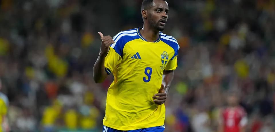 Swedish player celebrating during football match
