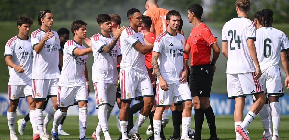 Real Madrid players greeting officials before training session
