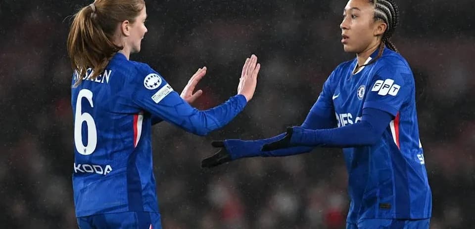 Two Chelsea players celebrating during match