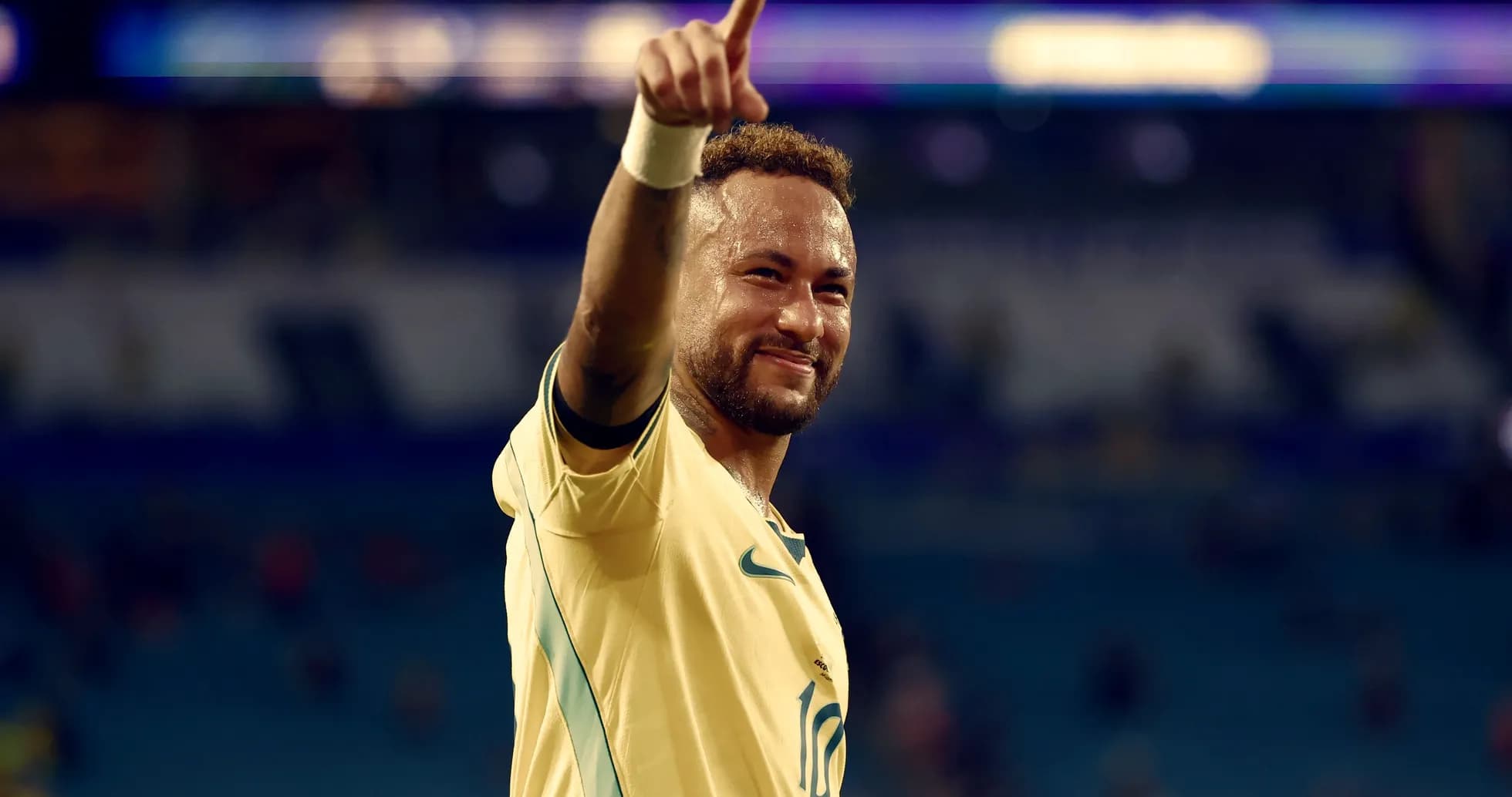 Neymar celebrating and pointing after a match