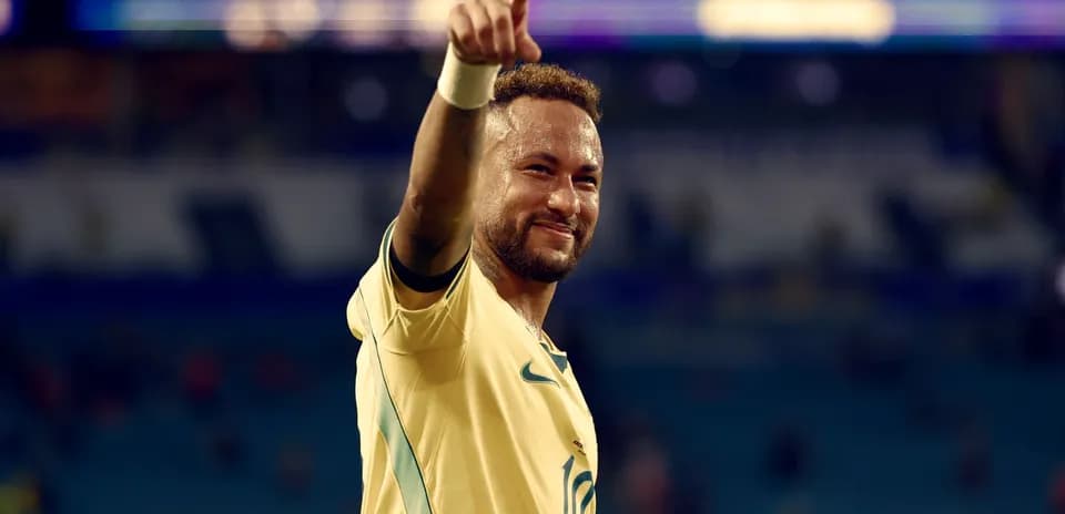 Neymar celebrating and pointing after a match