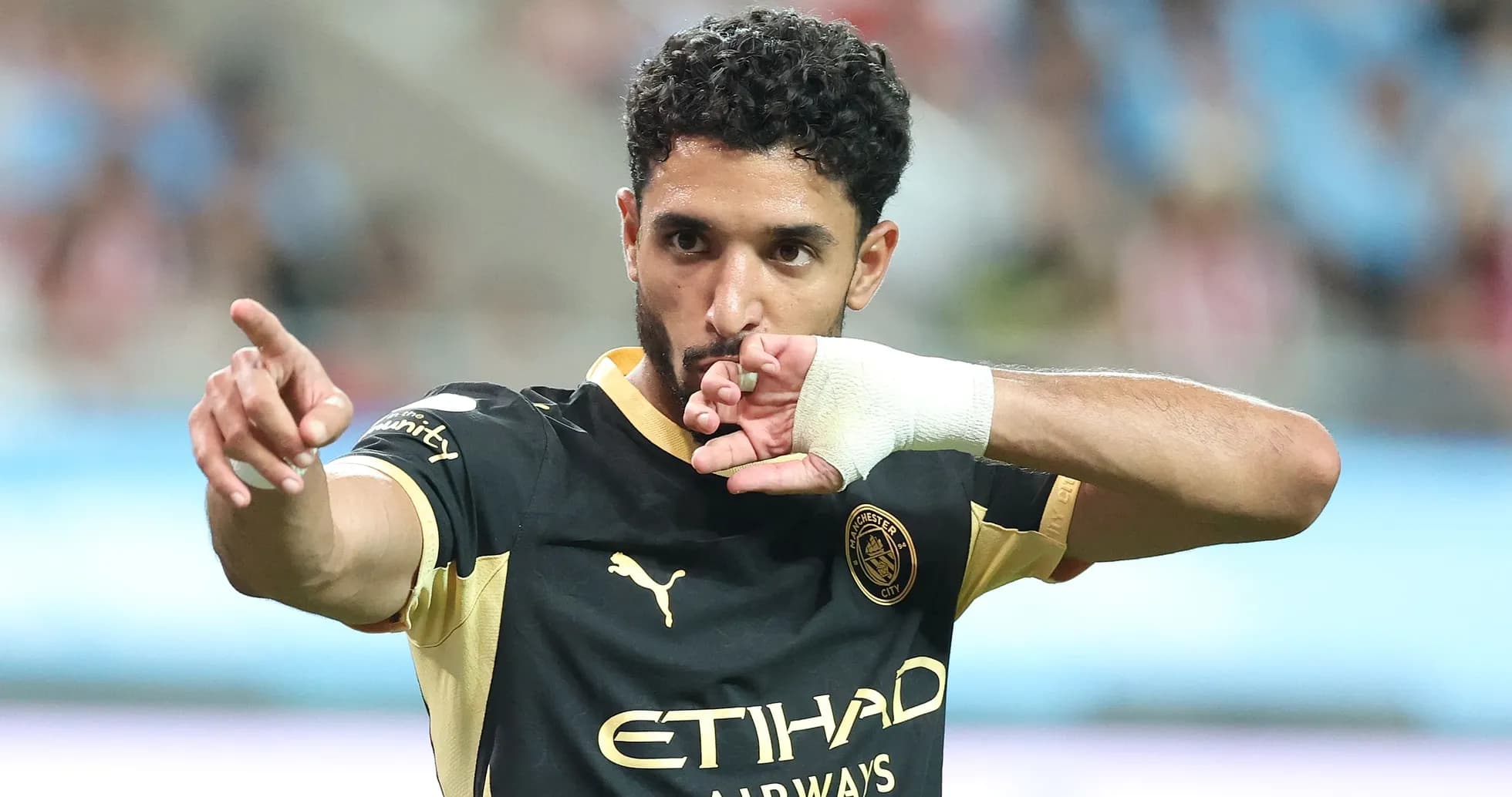 Player celebrating with hand gesture during match