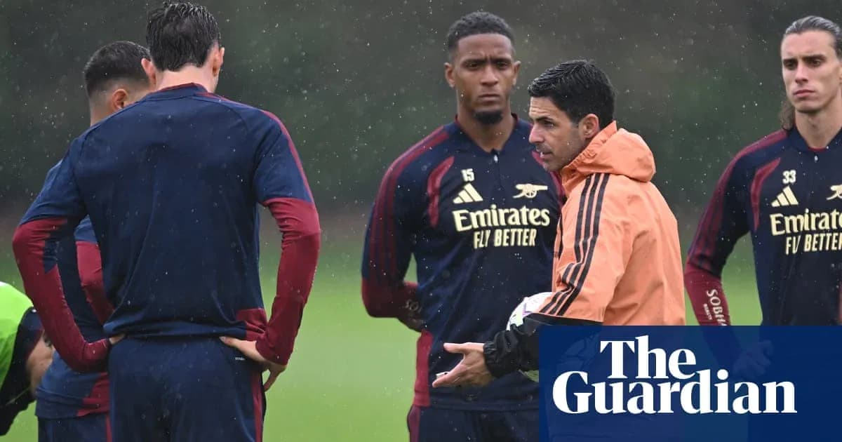 Manager instructing players during training session