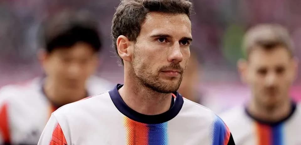 Player in Bayern Munich kit walking onto the pitch