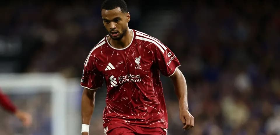 Player in Liverpool kit during match action