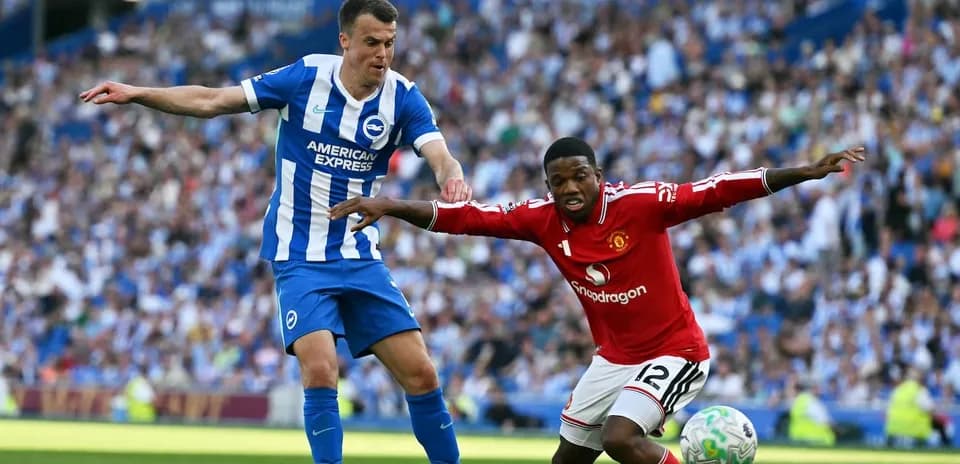 Brighton and Manchester United players in action