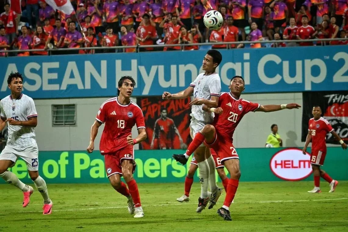 Players contesting for the ball during a match