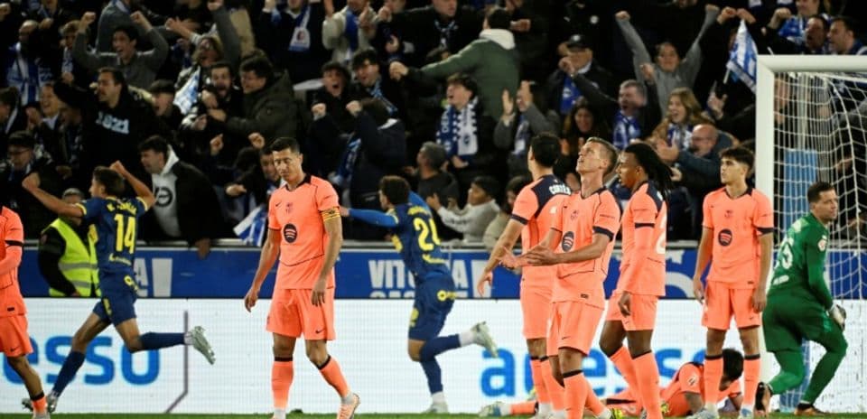 Players reacting during a tense football match