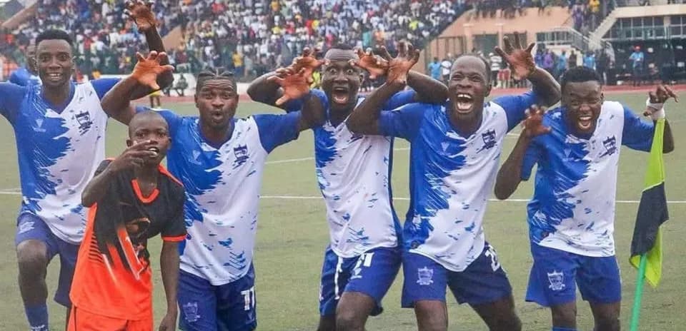 Players celebrating after scoring a goal