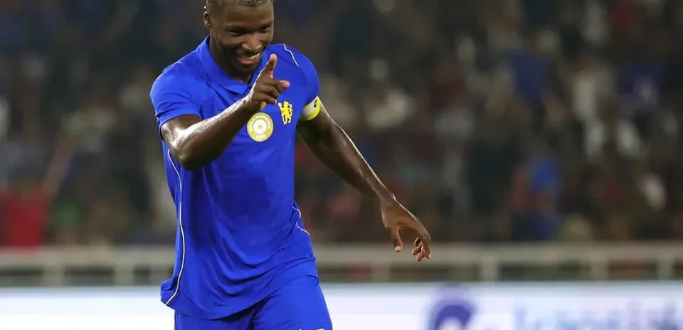 Player celebrating after scoring a goal during match