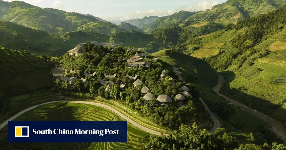 Aerial view of hillside village surrounded by rice terraces
