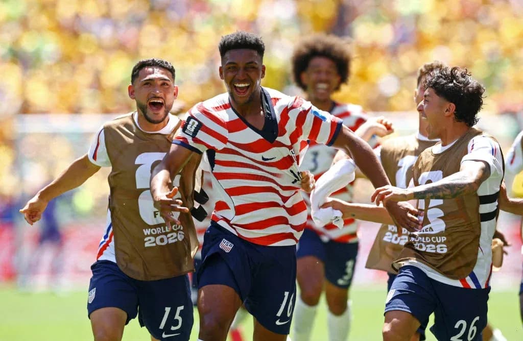 Players celebrating a goal during World Cup match