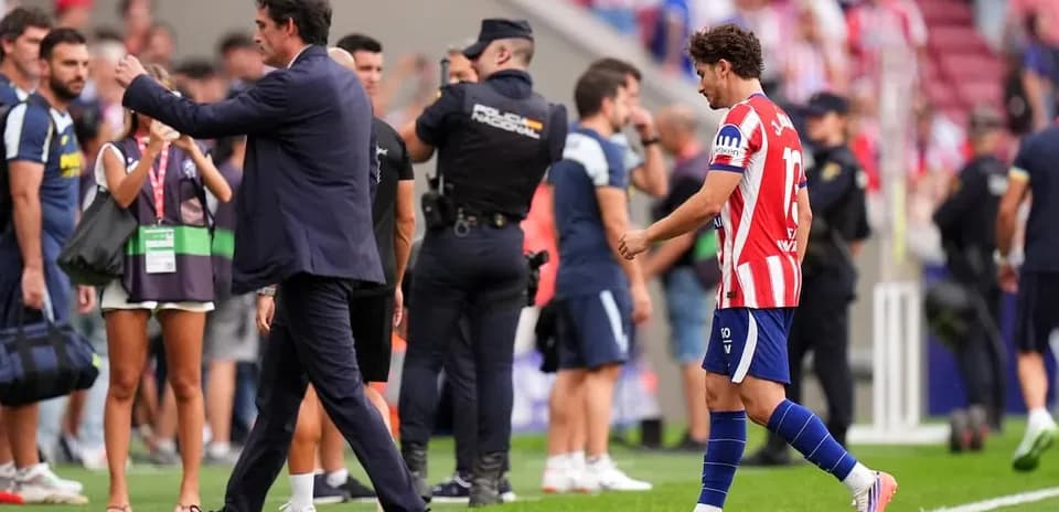 Player walking off the field after match conclusion