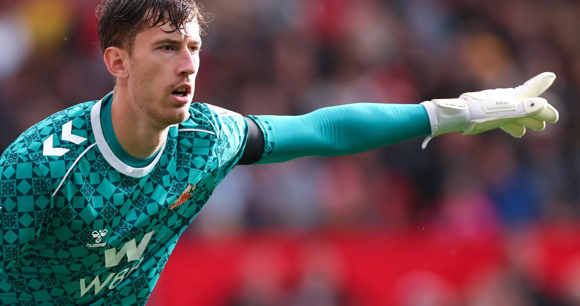 Sunderland goalkeeper directing play during match
