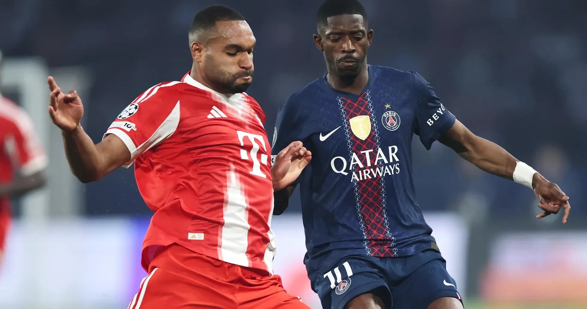 Bayern and PSG players competing for the ball