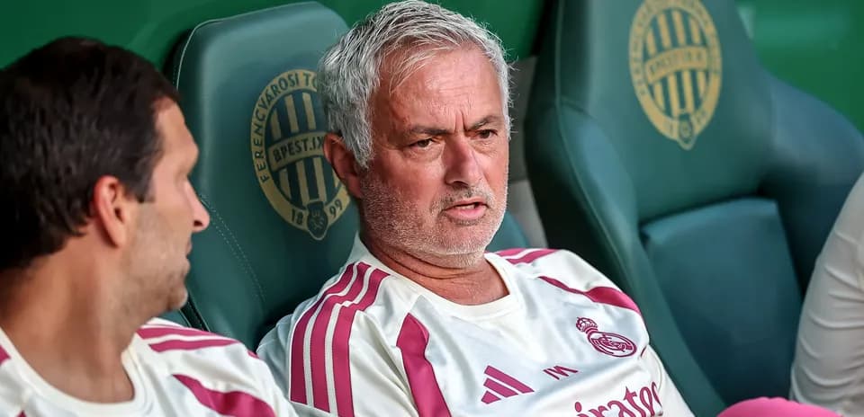 Manager discussing strategies on the bench