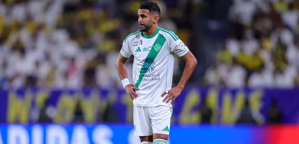 Player in green and white kit during match