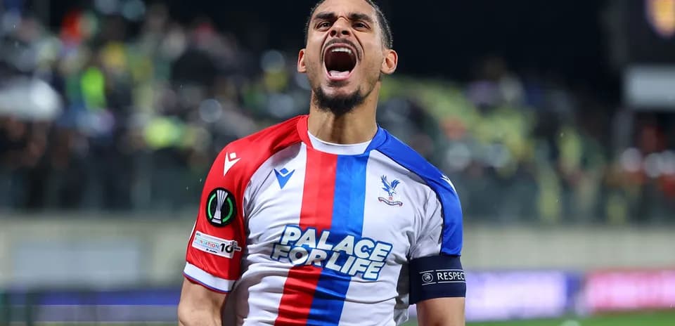 Player celebrating passionately after scoring a goal