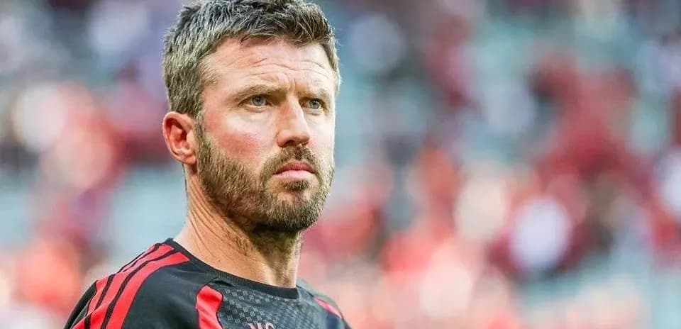 Coach focused before the match in stadium