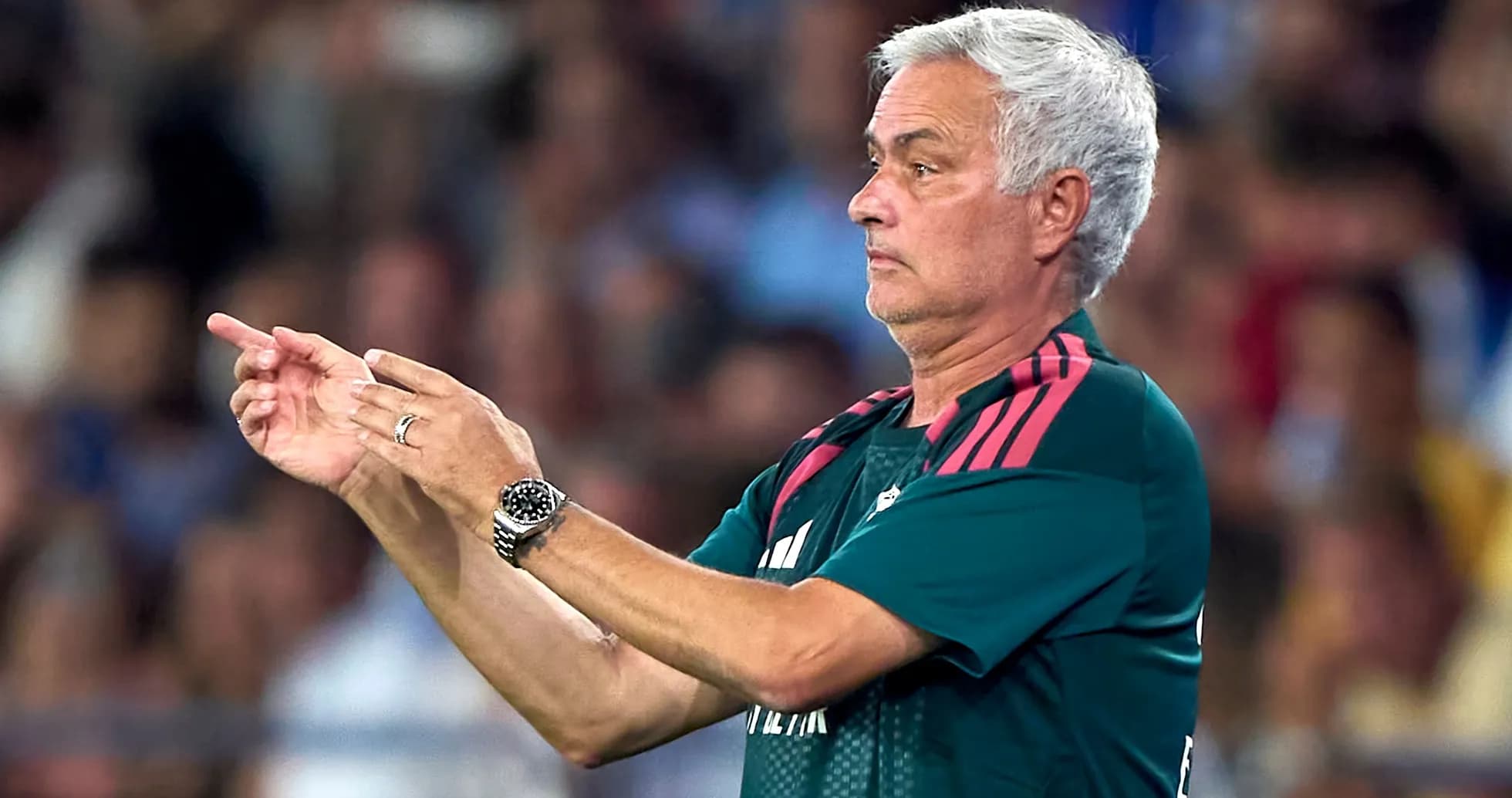 Manager directing players during a match