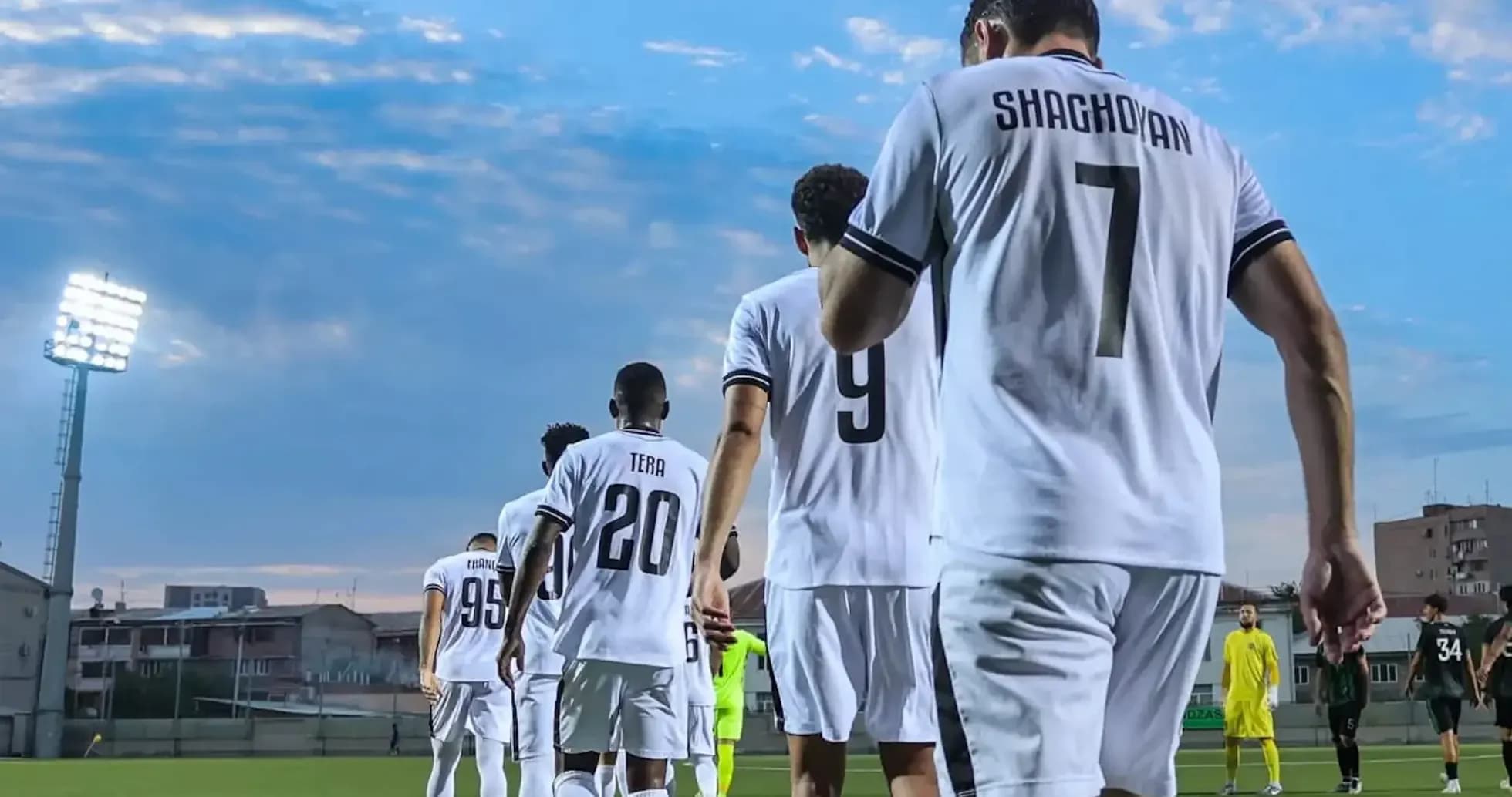 Players walking onto the pitch for match