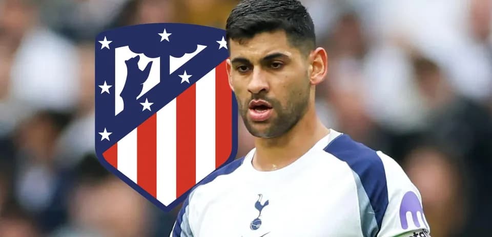 Player in Tottenham kit with Atlético Madrid logo behind
