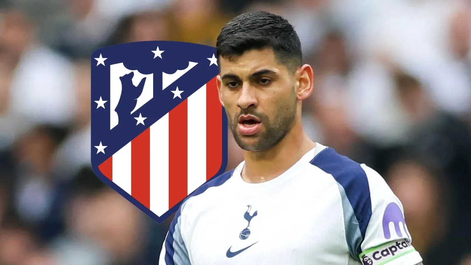 Player in Tottenham kit with Atlético Madrid logo behind