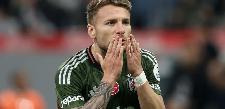 Player blowing kisses to fans during match