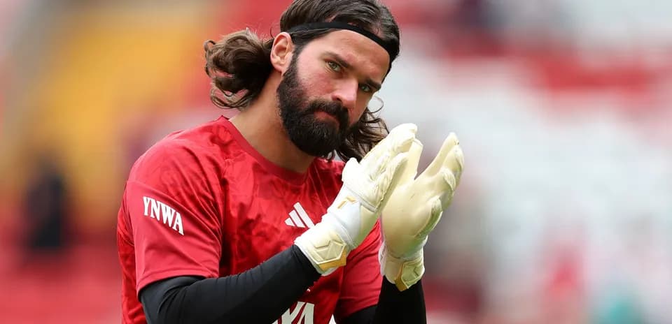 Goalkeeper warming up and clapping hands