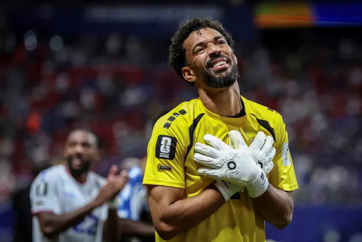 Goalkeeper celebrating with teammates after match
