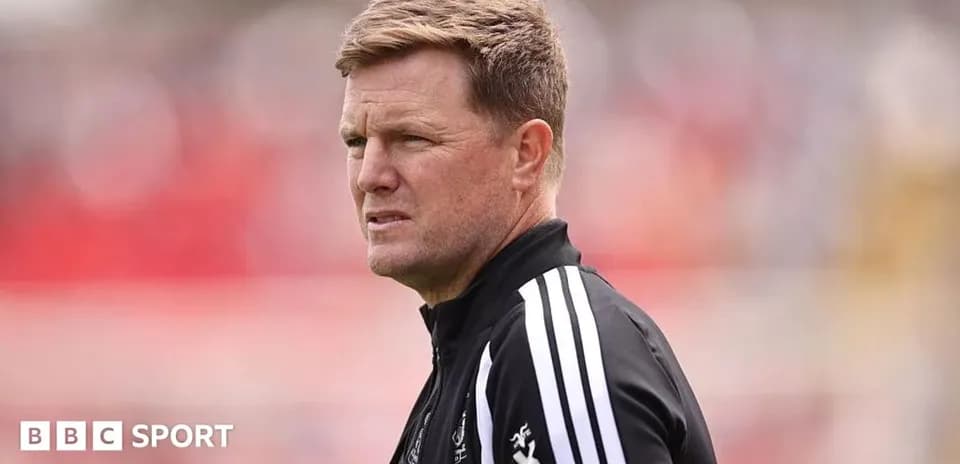 Coach observing during a match on the sidelines