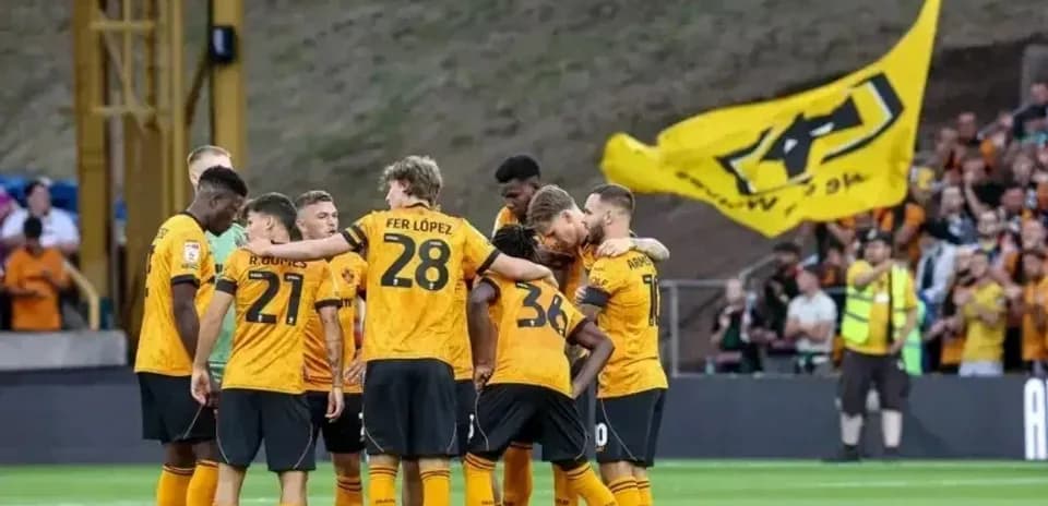 Wolverhampton players huddled before a match