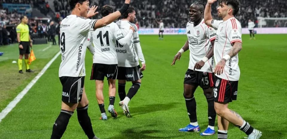 Beşiktaş players celebrating on the pitch