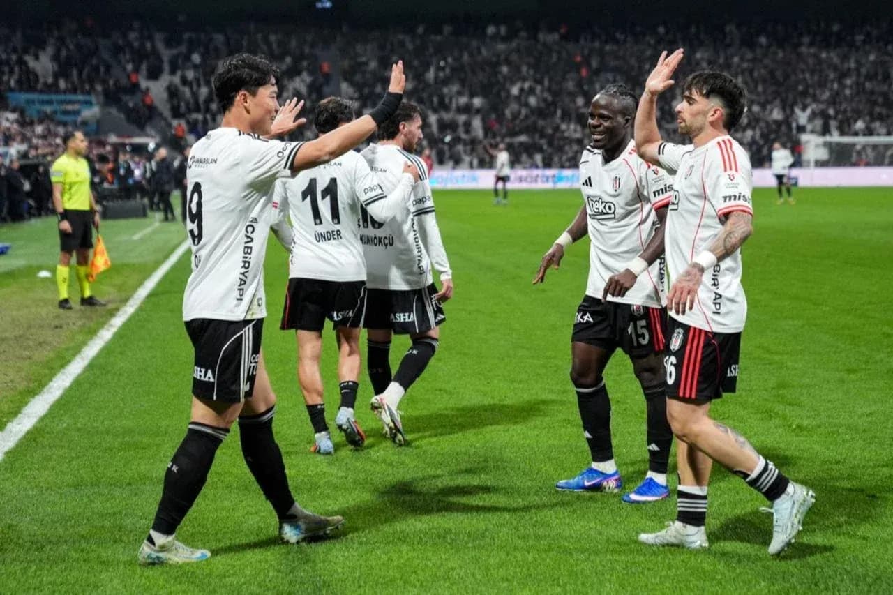 Beşiktaş players celebrating on the pitch