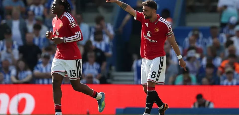 Manchester United players celebrating during match