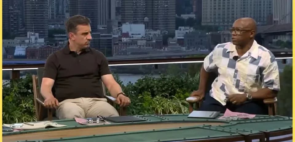 Two commentators discussing sports on outdoor set